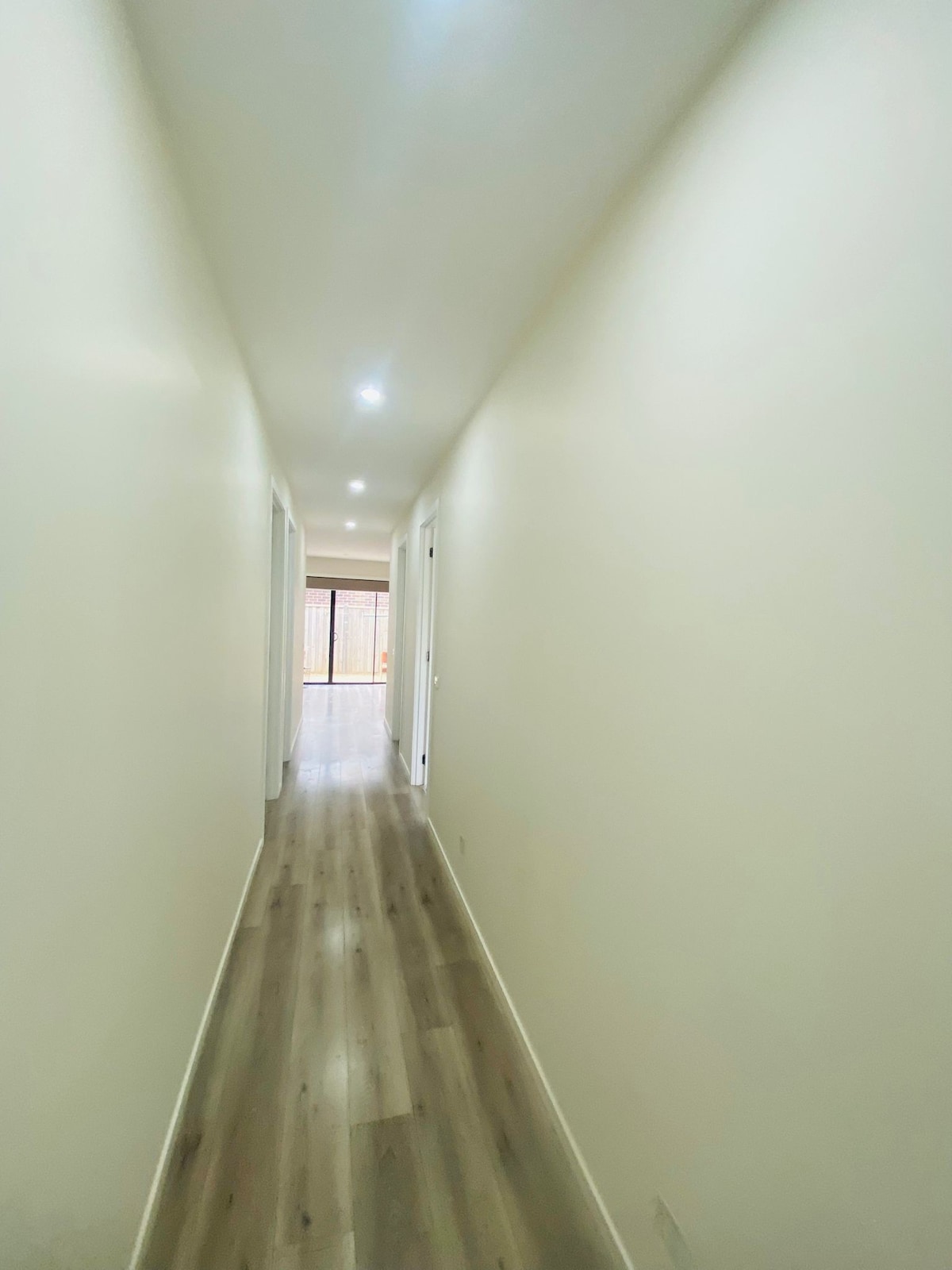 Hallway leading toward the living area at Luxe Nest, 33 Maya Avenue